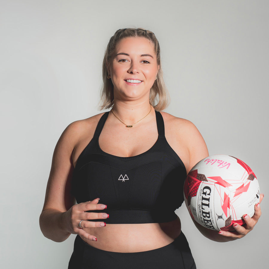 eleanor cardwell in black maaree solidarity sports bra